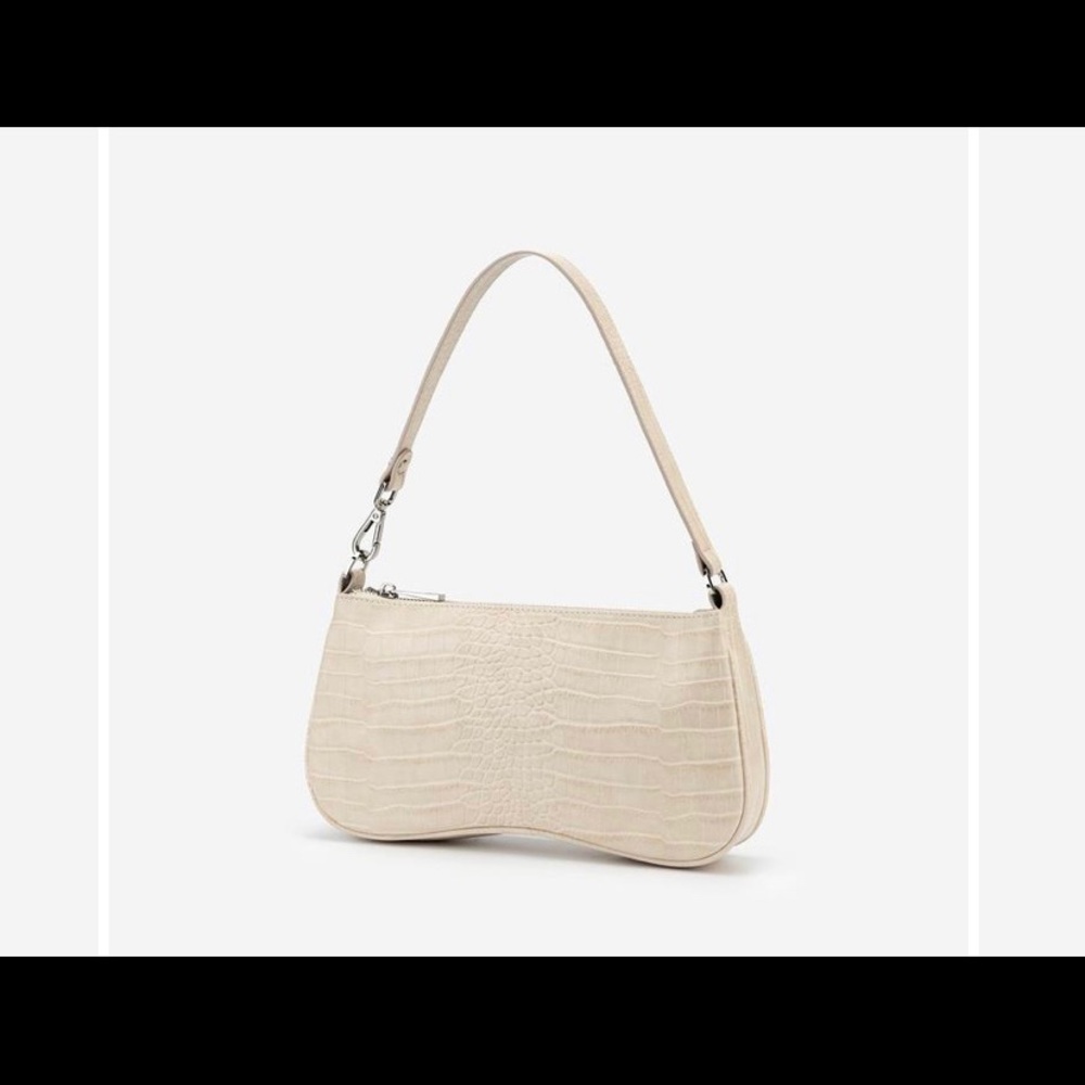 Croc embossed vegan leather.